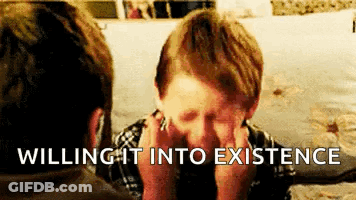 A Young Boy Is Covering His Face With His Hands And The Words Willing It Into Existence Are Written Above Him . GIF