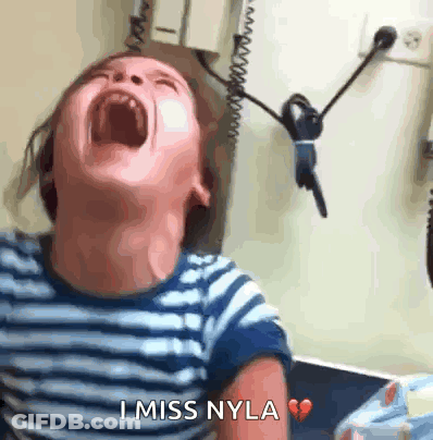 A Young Boy Is Crying With His Mouth Wide Open And The Words " I Miss Nyla " On The Bottom GIF