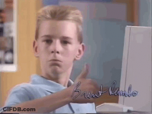 A Young Boy Is Giving A Thumbs Up In Front Of A Computer With The Name Brunt Lambo Written On It GIF