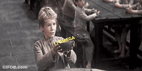 A Young Boy Is Holding A Bowl That Says Omega On It GIF