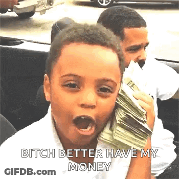 A Young Boy Is Holding A Stack Of Money In His Mouth And Making A Funny Face . GIF