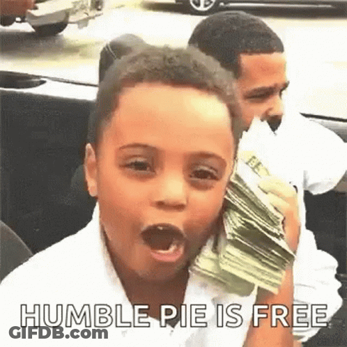 A Young Boy Is Holding A Stack Of Money In His Mouth While Sitting In A Car . GIF