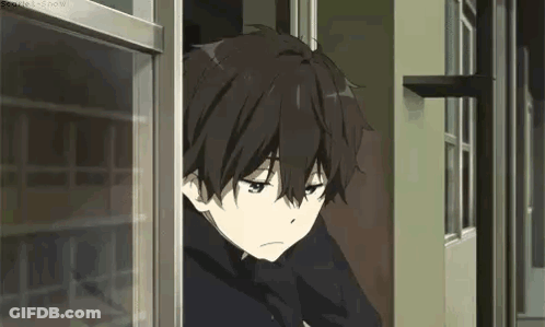 A Young Boy Is Looking Out Of A Window . GIF