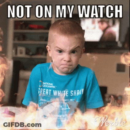 A Young Boy Is Making A Funny Face In Front Of A Fire . GIF