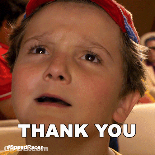 A Young Boy Is Making A Thank You Sign GIF