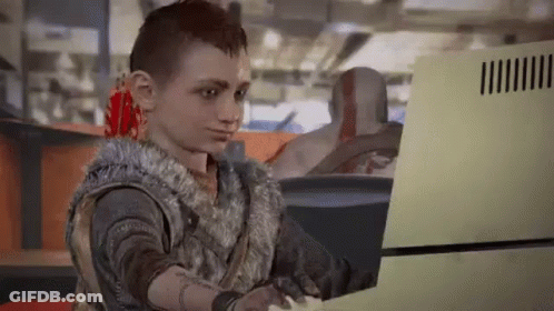 A Young Boy Is Playing A Video Game On A Computer In A Video Game . GIF