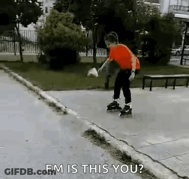 A Young Boy Is Rollerblading On A Sidewalk In A Park And A Person Is Asking Him If He Is This You . GIF