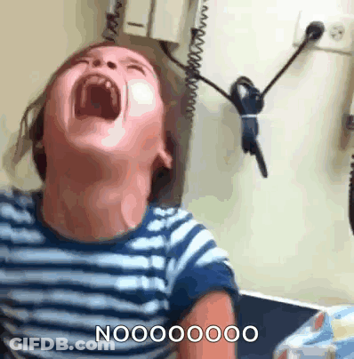 A Young Boy Is Screaming With His Mouth Wide Open And The Word Nooo On The Bottom Right GIF