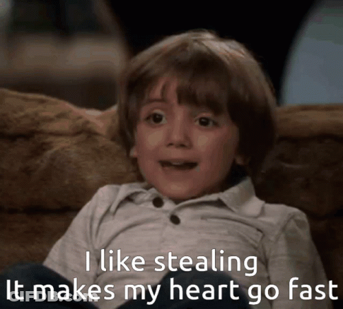 A Young Boy Is Sitting On A Couch With The Words " I Like Stealing It Makes My Heart Go Fast " GIF