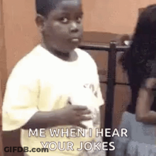 A Young Boy Is Standing In Front Of A Woman And Holding A Bottle Of Milk . GIF
