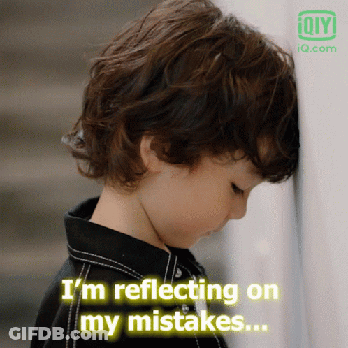 Boy Leaning Against Wall Reflecting On Mistakes GIF