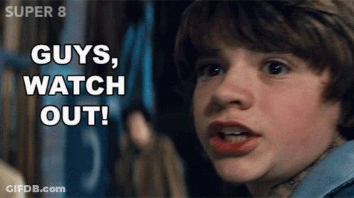 A Young Boy Says " Guys Watch Out " In Front Of A Super 8 Sign GIF