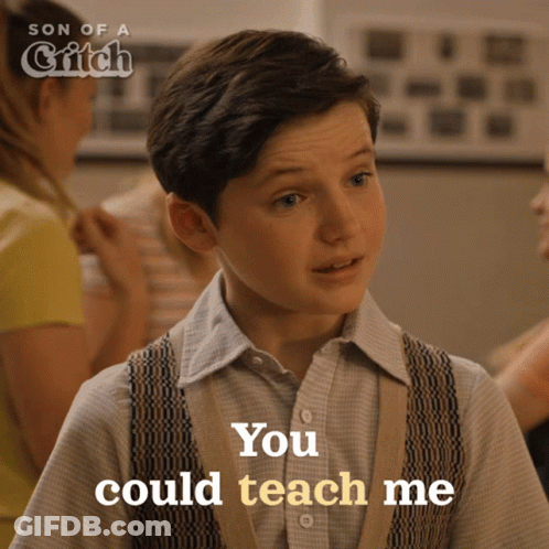 A Young Boy Says You Could Teach Me In Front Of A Poster For Son Of A Glitch GIF