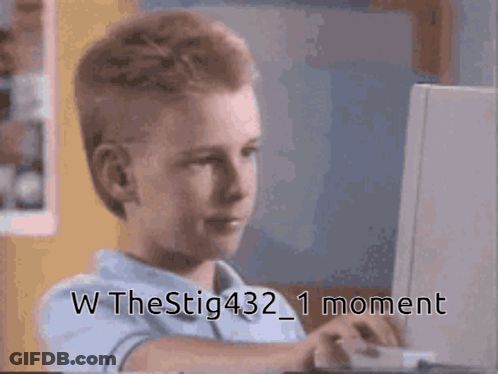 A Young Boy Sitting In Front Of A Computer With The Username W The Stig432 GIF
