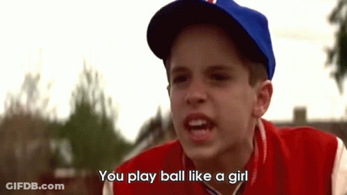 A Young Boy Wearing A Baseball Cap And A Red Jacket Says " You Play Ball Like A Girl " GIF