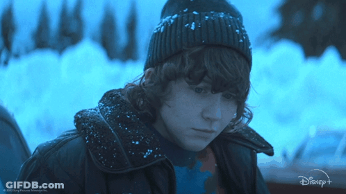 A Young Boy Wearing A Beanie And A Jacket Is Featured In A Disney+ Ad GIF