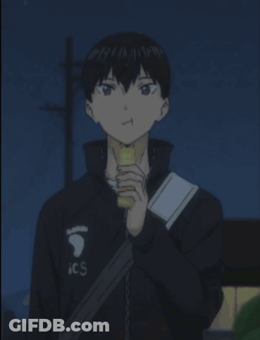 A Young Boy Wearing A Black Jacket With Ics On It GIF