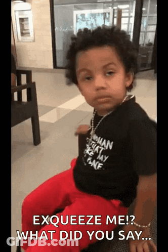 Young Boy In Black Shirt And Red Pants GIF