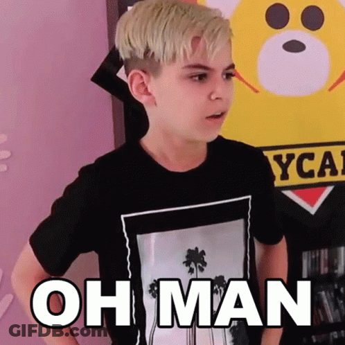 A Young Boy Wearing A Black T-Shirt With The Words Oh Man On It . GIF