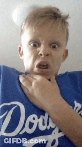 A Young Boy Wearing A Blue Dodgers Shirt Makes A Funny Face GIF