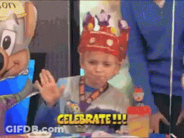 A Young Boy Wearing A Crown Says Celebrate !!! GIF
