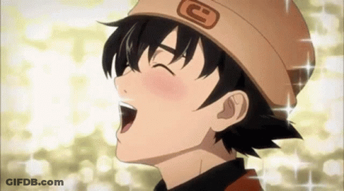 A Young Boy Wearing A Hat Is Yawning With His Mouth Open And His Eyes Closed . GIF