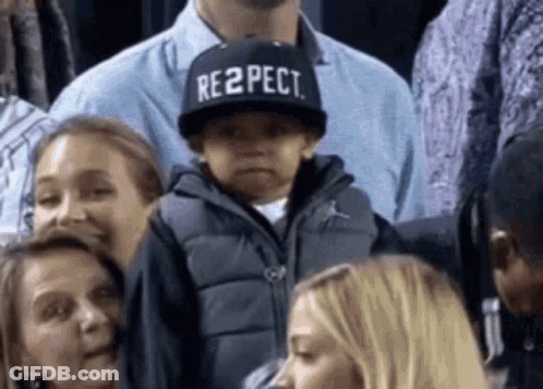 Boy Wearing Respect Hat Sitting In Stands GIF