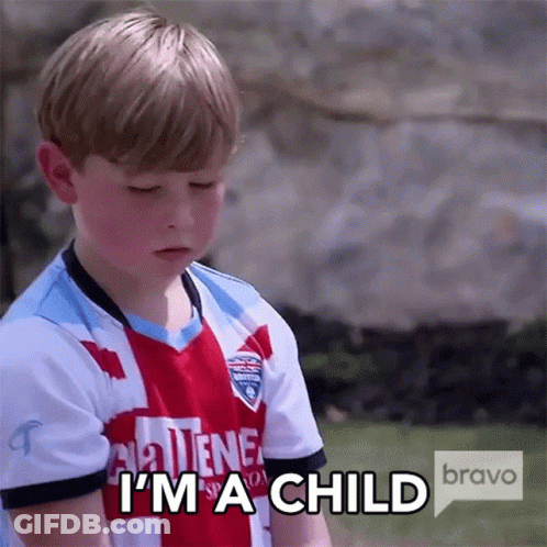 A Young Boy Wearing A Jersey That Says I 'M A Child GIF