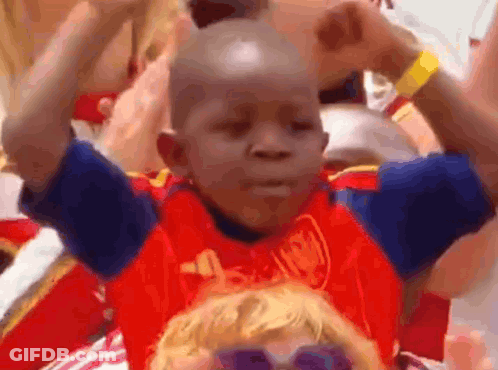 A Young Boy Wearing A Red Shirt That Says Mcdonalds GIF