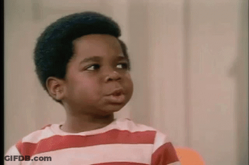 Boy In Striped Shirt Making Funny Face GIF