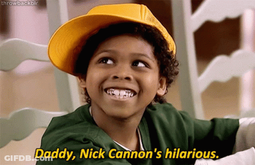 A Young Boy Wearing A Yellow Hat Says Daddy Nick Cannon 'S Hilarious .. GIF
