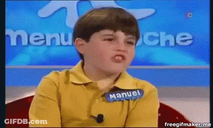 A Young Boy Wearing A Yellow Shirt With The Name Manuel On It GIF