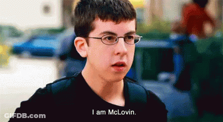 A Young Boy Wearing Glasses And A Black Shirt Says I Am Mclovin GIF