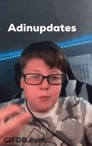 A Young Boy Wearing Glasses And Headphones With The Word Adiupdates Above Him GIF