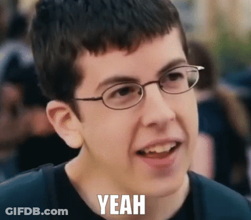 A Young Boy Wearing Glasses Is Making A Funny Face With The Words Yeah Written Below Him GIF