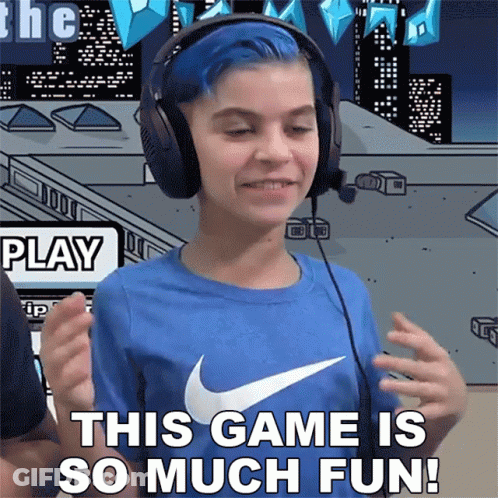 A Young Boy Wearing Headphones And A Blue Shirt Says This Game Is So Much Fun GIF