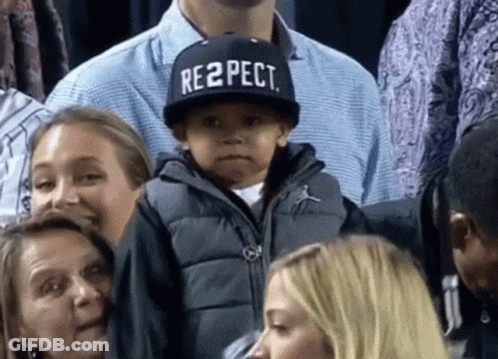 A Young Boy Wears A Hat That Says Respect GIF
