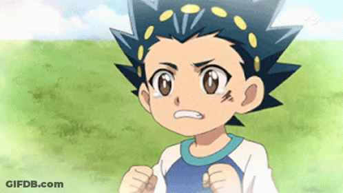 A Young Boy With A Blue Shirt On Is Standing In A Grassy Field . GIF