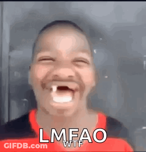 A Young Boy With A Missing Tooth Is Making A Funny Face And Laughing . GIF