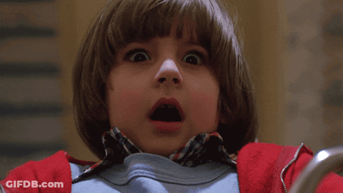 A Young Boy With A Surprised Expression On His Face GIF