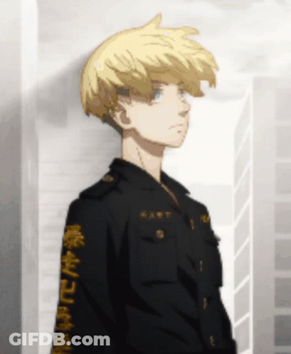 A Young Boy With Blonde Hair Is Wearing A Black Jacket With Chinese Writing On The Sleeves . GIF