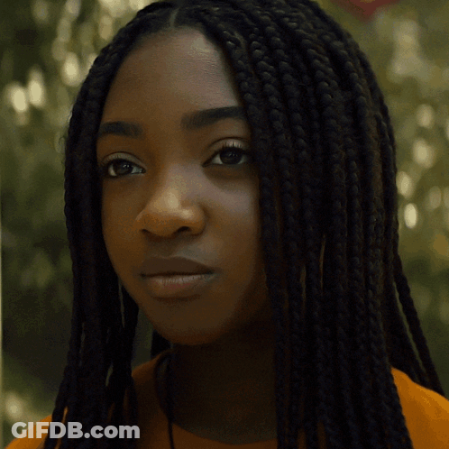 A Young Boy With Curly Hair Is Wearing A Yellow Shirt With The Word Valley On It GIF