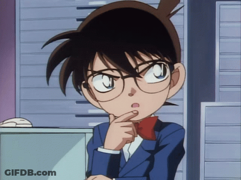 A Young Boy With Glasses And A Red Bow Tie Is Thinking GIF