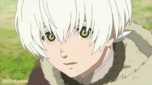 A Young Boy With White Hair And Green Eyes GIF