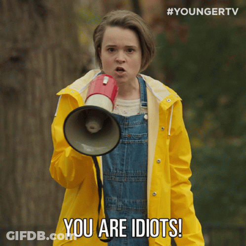 A Young Girl In A Yellow Raincoat Is Holding A Megaphone And Says You Are Idiots GIF