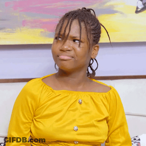 Girl In Yellow Top Making Funny Face GIF