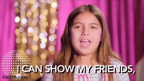 A Young Girl Is Making A Funny Face And Saying `` I Can Show My Friends , '' . GIF