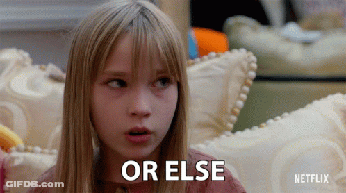 A Young Girl Sitting On A Couch With The Words Or Else Written On Her Face GIF