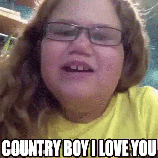 A Young Girl Wearing Glasses And A Yellow Shirt Says Country Boy I Love You . GIF