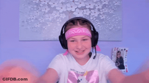 A Young Girl Wearing Headphones And A Bandana That Says ' Eternal Sunshine ' On It GIF
